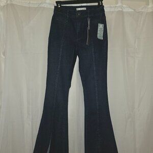 TRACTR dark denim flare with slit front leg and raw hem